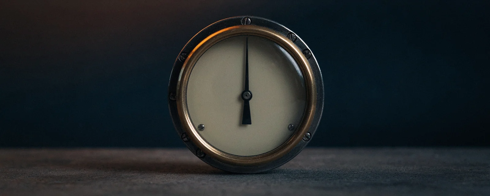 A precision dial gauge with its needle resting in the green zone, close-up, representing the final honest score against the ninety-day baseline