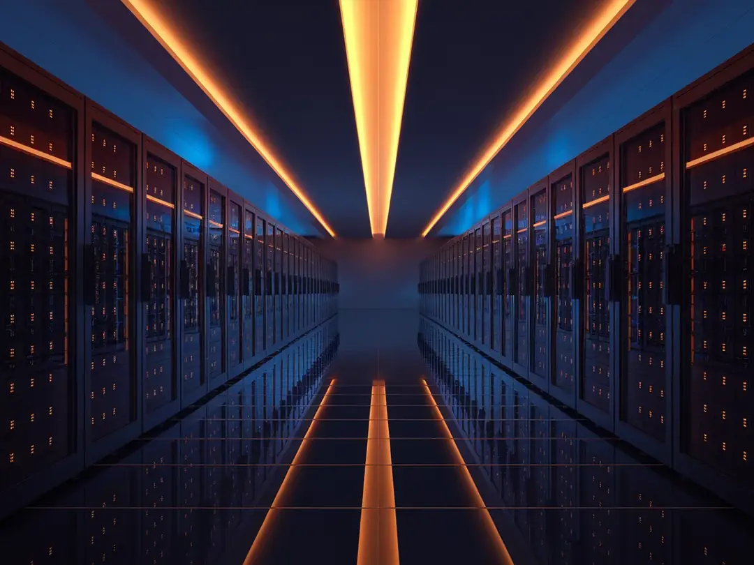 Enterprise data centre corridor with orange server LEDs