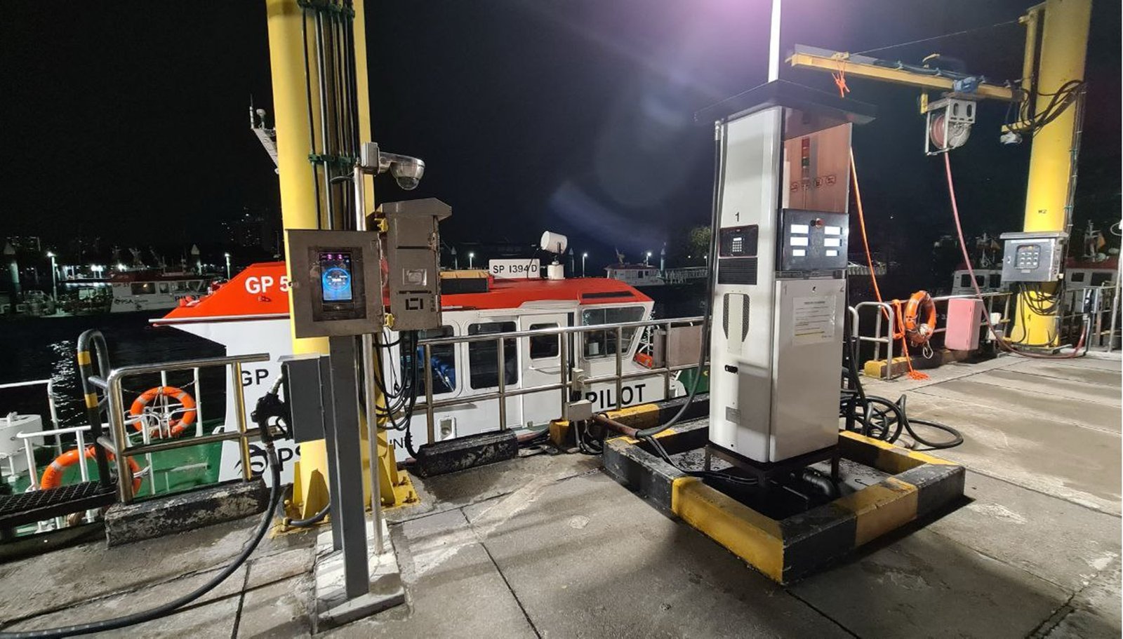 Secured biometric fuel bunkering station at night, PSA Marine base
