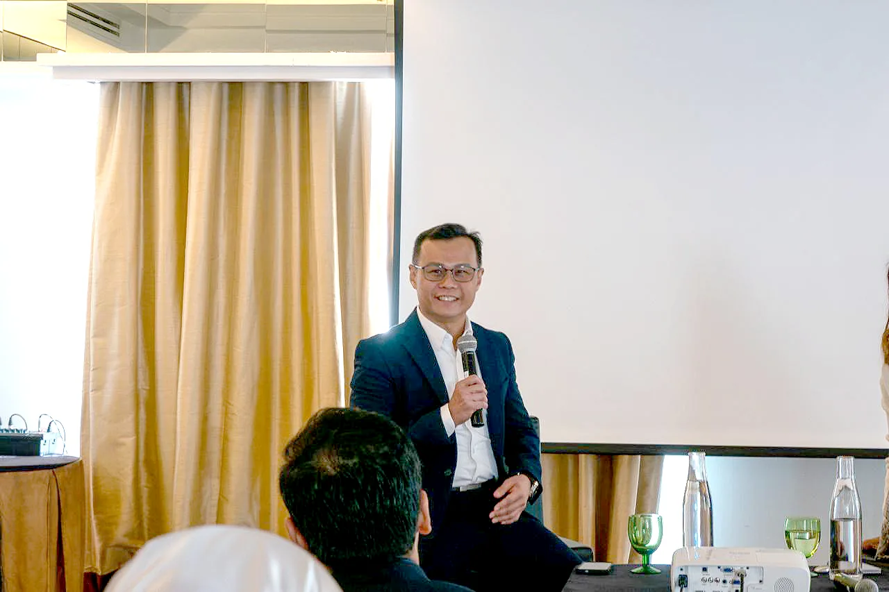 Terence Kok speaking during the capstone fireside chat for the CIMB Junior Leaders Development Programme, run by GIFT, at The Majestic Hotel Kuala Lumpur